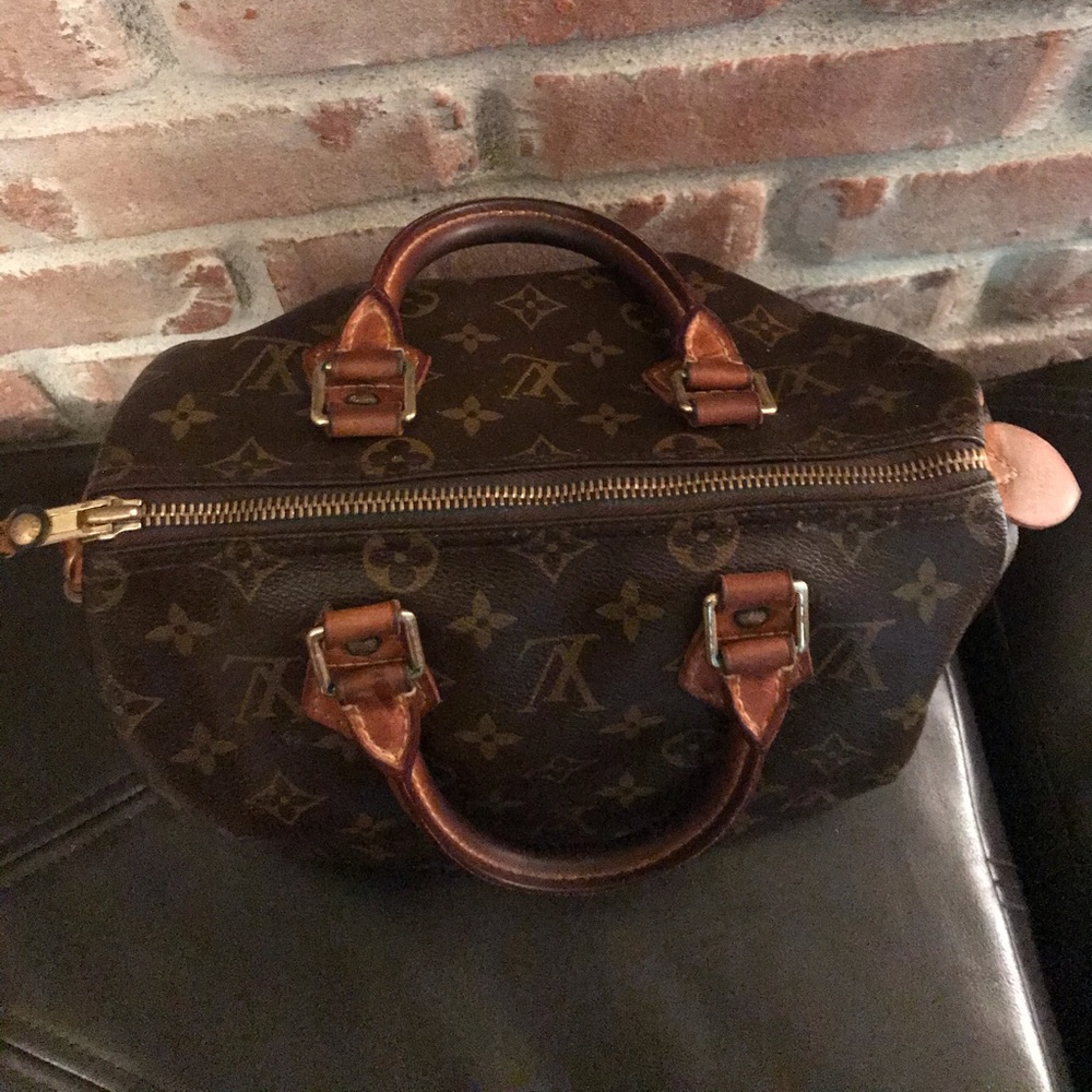 Authentic small Louis Vuitton duffle bag.